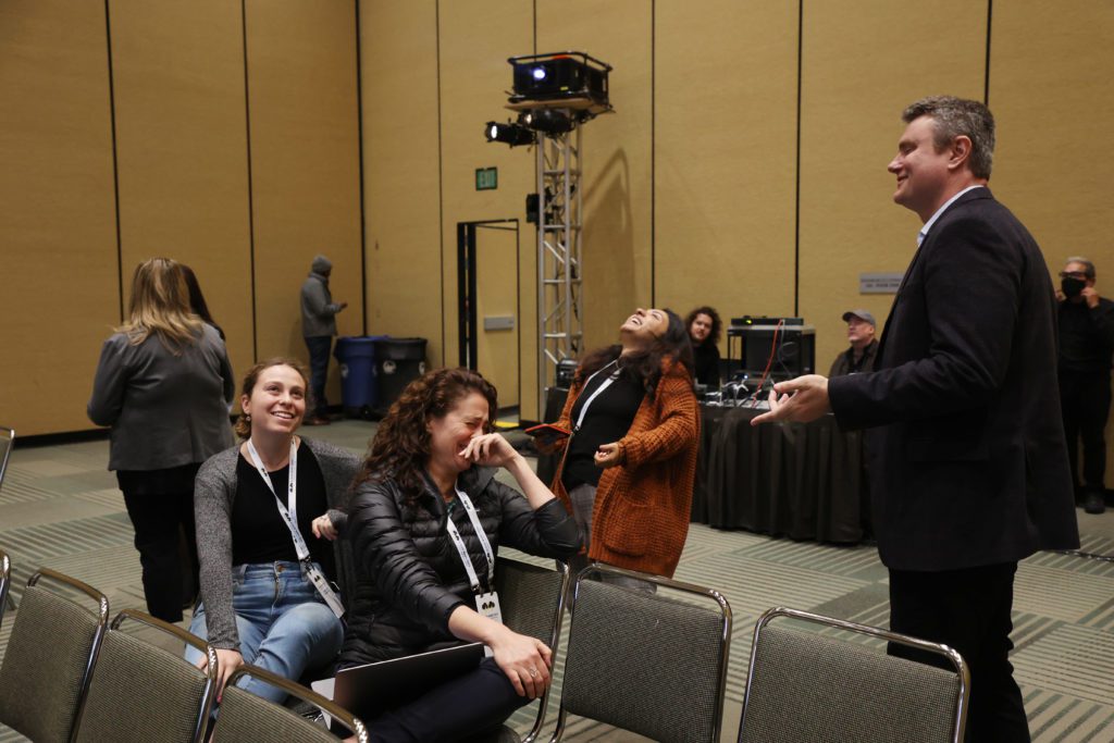 Manufacturing Industry Cloud Battleground attendees chatting between sessions at Cloud Wars Expo.