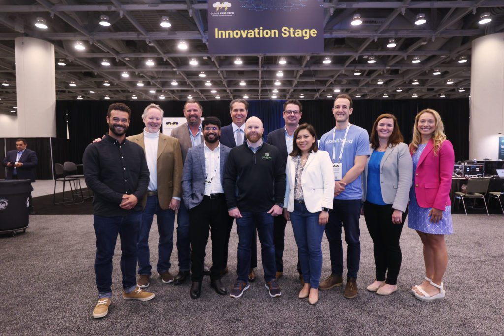 Cloud Wars Expo 2022 Innovation Stage group shot serious faces