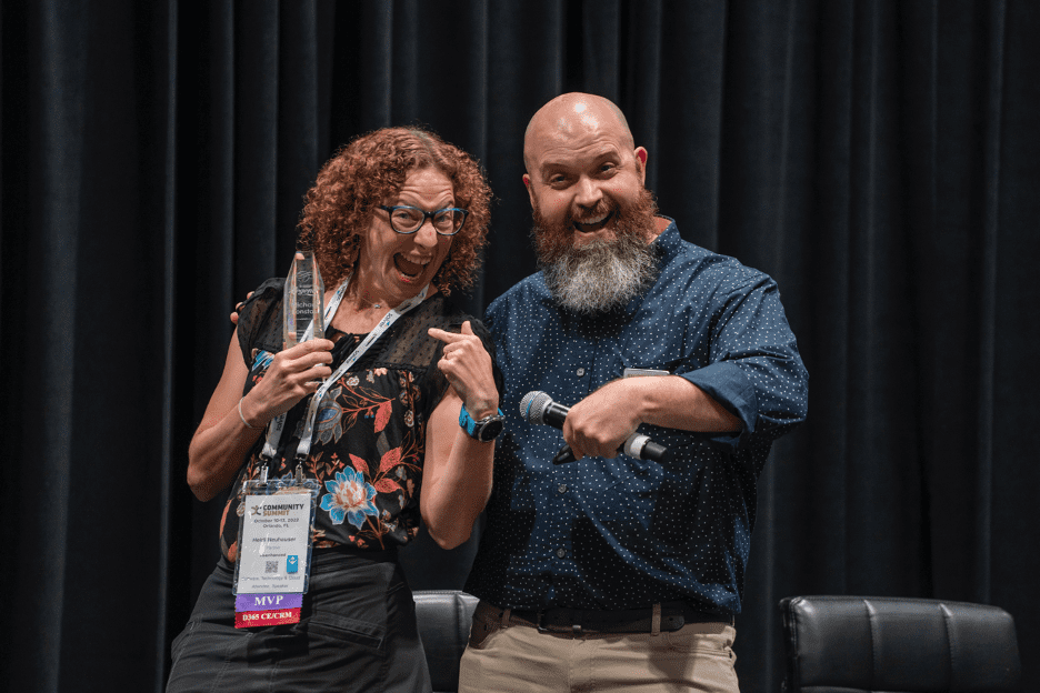 Heidi Neuhaser (left) and Aaron Back (right) at the Legends Award ceremony at Community Summit NA 2022